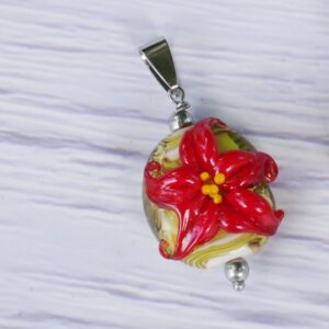 Pendentif fleur Poinsettia fond vert