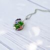 Collier petit oiseau et fleurs du jardin