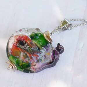 Collier petit oiseau et fleurs du jardin